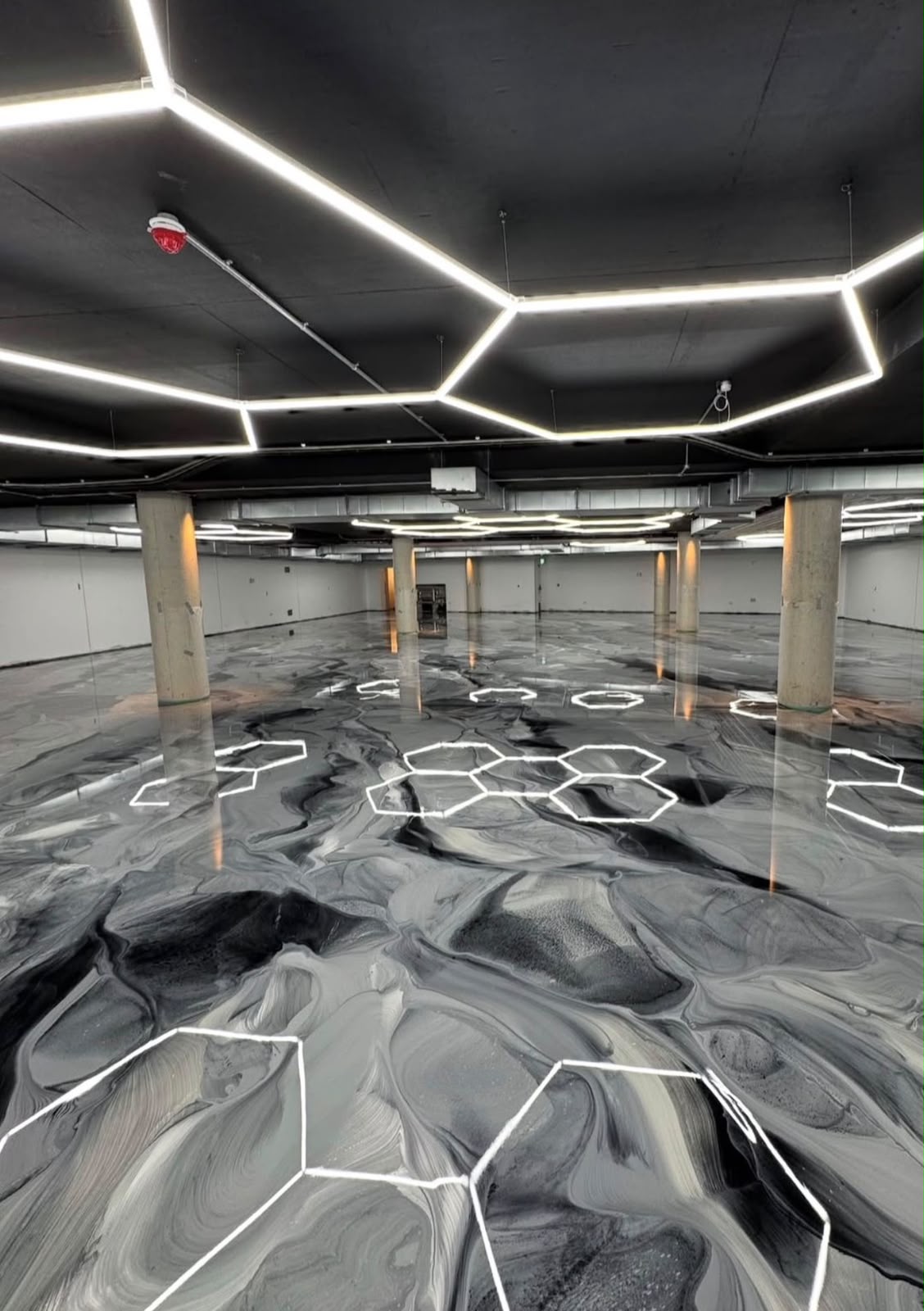 Metallic Epoxy Floor with Hexagon Lighting